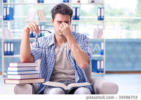 Student reading books and preparing for exams in Student reading books and preparing for exams in 39496703