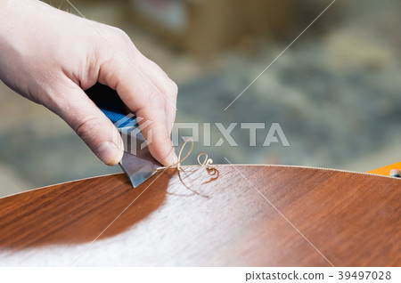 A close-up of the real male carpenter's not well 39497028