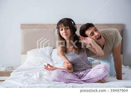 Young family meditating in the bed bedroom Young family meditating in the bed bedroom 39497904