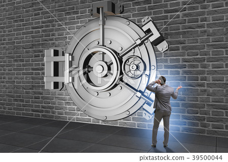 Businessman concerned about theft at banking vault Businessman concerned about theft at banking vault 39500044