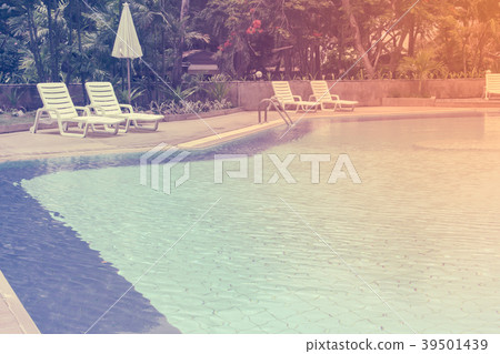 swimming pool and lounger with vintage style 39501439