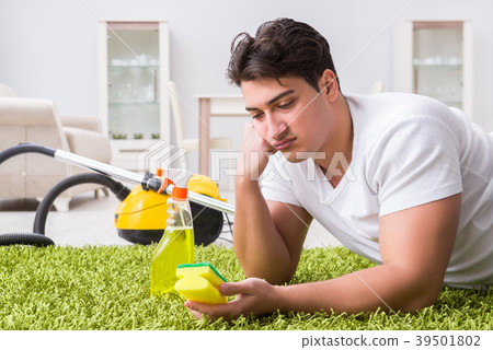 Young husband man cleaning floor at home 39501802