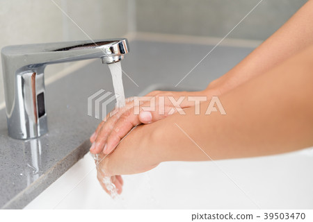 Selective focus of woman washing hands with soap Selective focus of woman washing hands with soap 39503470