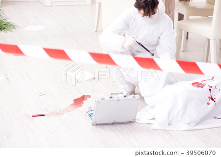 Forensics investigator at the scene of office Forensics investigator at the scene of office 39506070