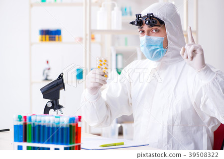 Drug synthesis concept with chemist working in Drug synthesis concept with chemist working in 39508322