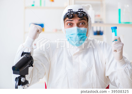 Young chemical scientist working in lab Young chemical scientist working in lab 39508325