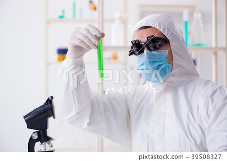 Chemist working on cannabis extract for medical Chemist working on cannabis extract for medical 39508327