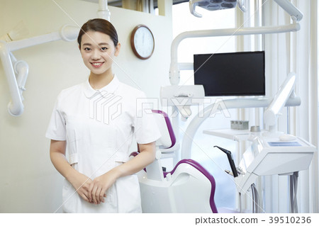 Woman working at dentist Woman working at dentist 39510236