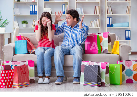Young pair after shopping with many bags 39510365