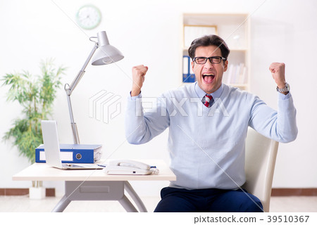 Young handsome businessman employee working in 39510367