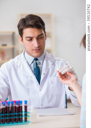 Patient during blood test sampling procedure taken 39510742