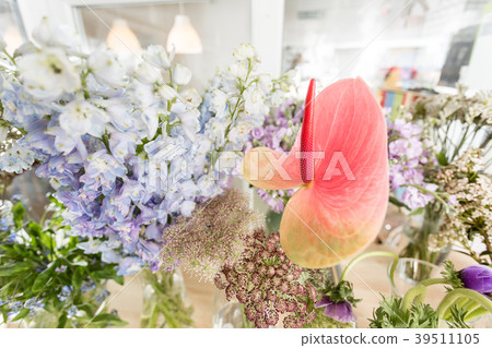 Flower shop concept. Different varieties fresh 39511105