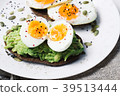 sandwich with fresh vegetables, avocado, hard 39513444