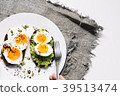sandwich with fresh vegetables, avocado, hard 39513474
