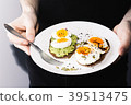 sandwich with fresh vegetables, avocado, hard 39513475