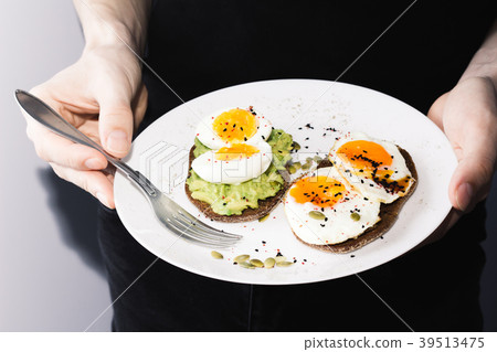 sandwich with fresh vegetables, avocado, hard 39513475