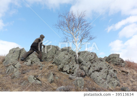 Nordic Walking - adult man climbing  of a mountain 39513634