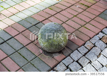 A large ball of gray stone 39517556