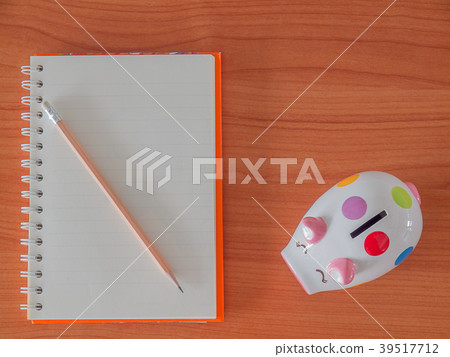 Top view , goals list with notebook , Piggy Bank. 39517712