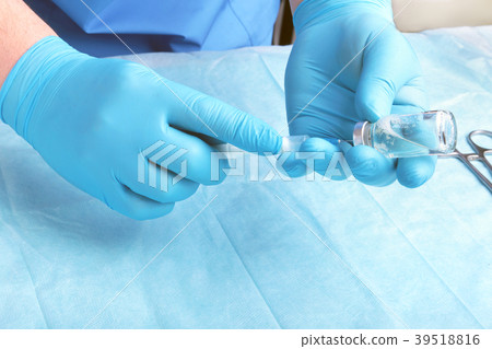 Syringe, medical injection, bottle, ampule in hand 39518816