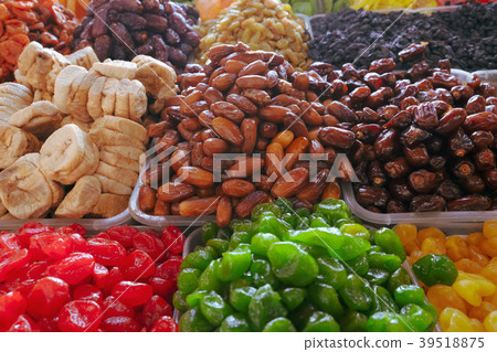 A handful of sweet dried fruits dates A handful of sweet dried fruits dates 39518875
