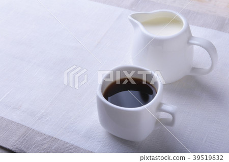 Cup of hot coffee espresso, coffee beans, jug of Cup of hot coffee espresso, coffee beans, jug of 39519832