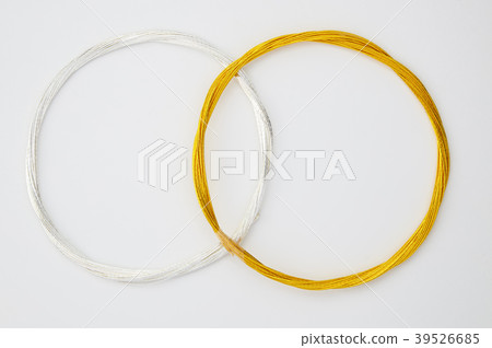 Paper money tied silver (paper strings tied around a wrapped gift) Paper money tied silver (paper strings tied around a wrapped gift) 39526685