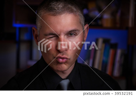 elegant man winks elegant man winks 39532191