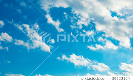 Blue sky with puffy white clouds Blue sky with puffy white clouds 39533104