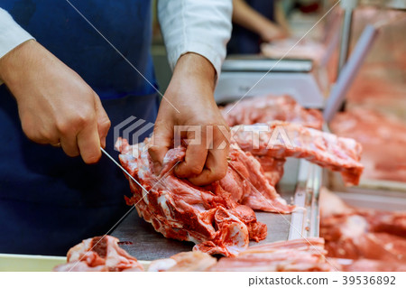 Carving raw meat. Raw meat curving Carving raw meat. Raw meat curving 39536892