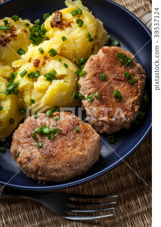 Meatballs served with boiled potatoes 39537124