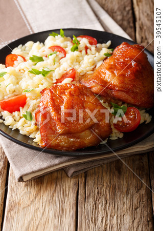 Fried glazed chicken thighs with rice, greens 39545107