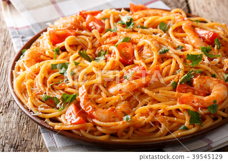 Italian pasta spaghetti with prawns, parmesan 39545129