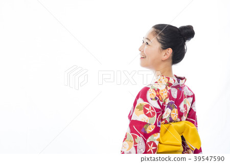 A woman in a yukata A woman in a yukata 39547590