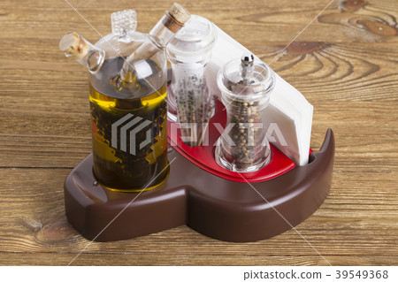 Set of spices on a wooden table. Set of spices on a wooden table. 39549368