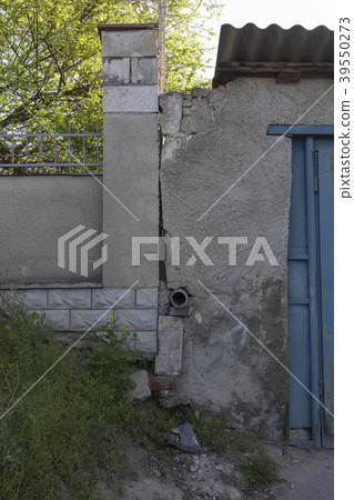 Water drain in the wall. 39550273