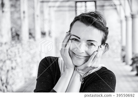 Joyful woman in medieval corridor, Telc, colorless Joyful woman in medieval corridor, Telc, colorless 39550692