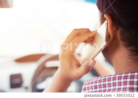 using smart phone mobile phone in car.	 39553522