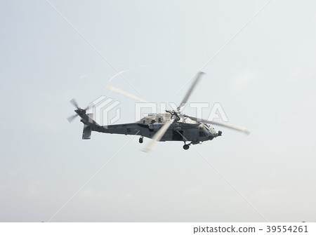 US Navy carrier-borne HH-60H rescue hawk rescue helicopter flying in the sky 39554261