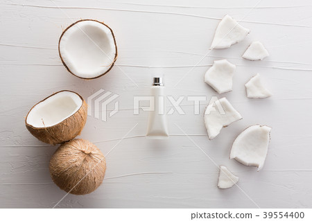 Homemade coconut products on white wooden table b Homemade coconut products on white wooden table b 39554400