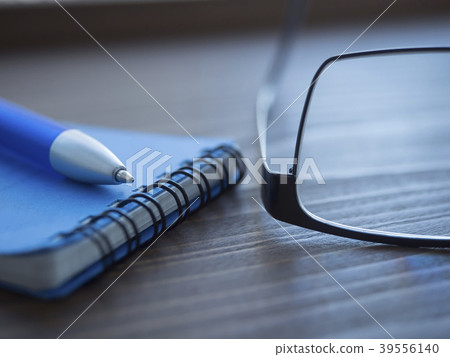 Business image · glasses · notebook Business image · glasses · notebook 39556140