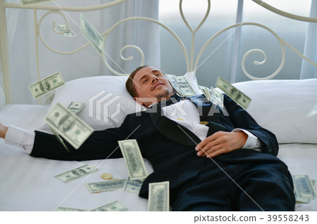 Concept Very wealthy businessman. Businessman is happy with his Concept Very wealthy businessman. Businessman is happy with his 39558243