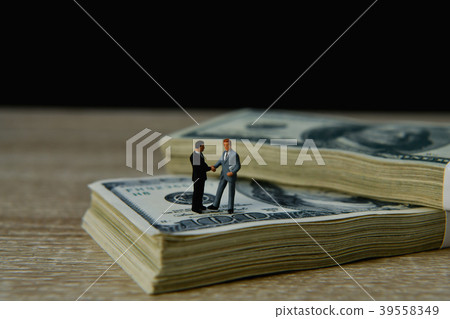 Finance Business Concepts. Lots of money on a black background. 39558349