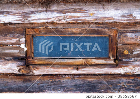 Small window in an old wooden shed Small window in an old wooden shed 39558567