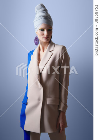Beautiful lady in color suit and turban on head 39559753