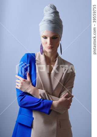 Beautiful lady in color suit and turban on head 39559755
