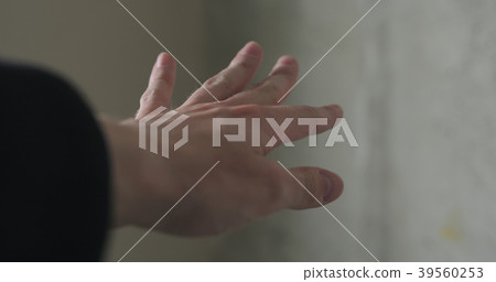dusty man hand indoor shot 39560253