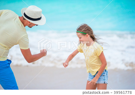 Happy father and his adorable little kid at Happy father and his adorable little kid at 39561778