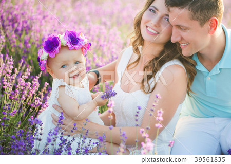 Young family in a lavender field Young family in a lavender field 39561835