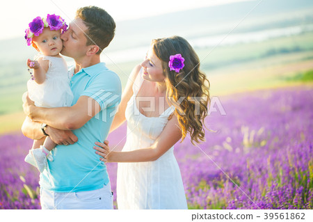 Young family in a lavender field Young family in a lavender field 39561862